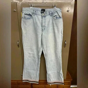 No Boundaries flared light denim jeans with ribbon detail